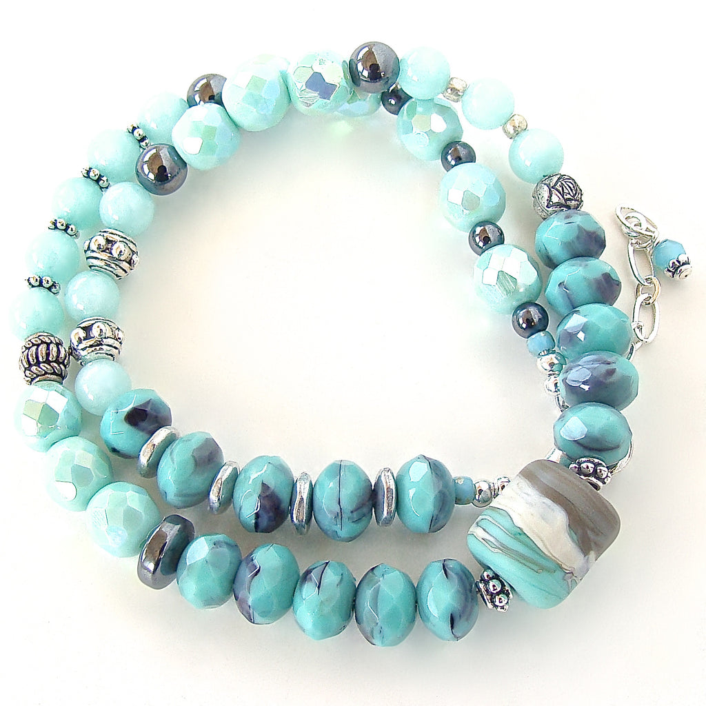Beaded wrap bracelet in aqua and purple