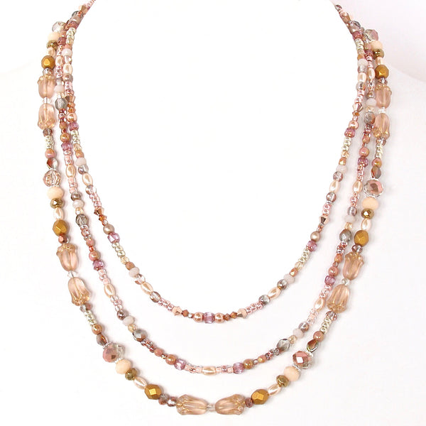mixed metal necklace with rose gold accents