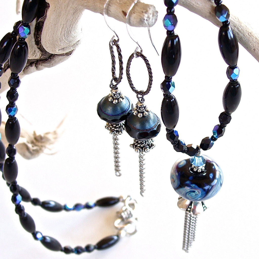 Black and blue jewelry set with silver tassel