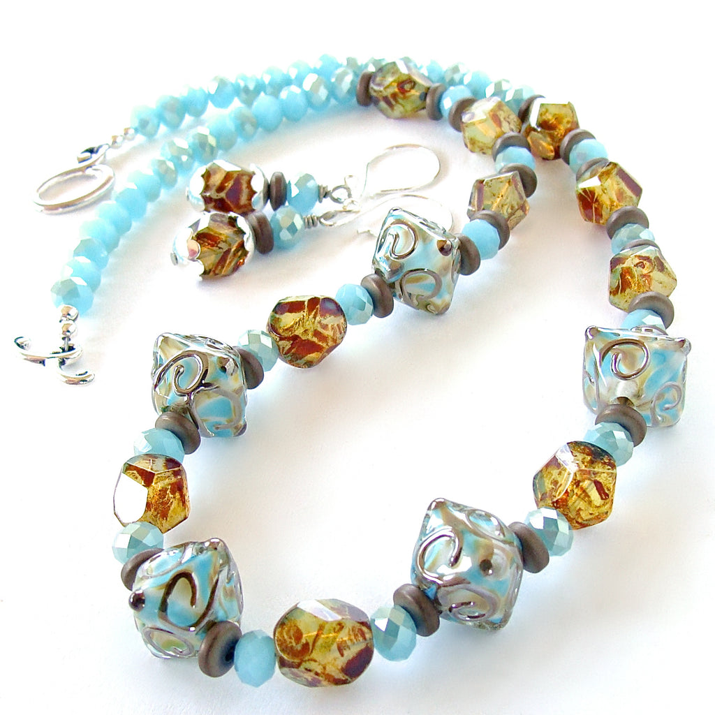 Light blue crystal necklace with art glass