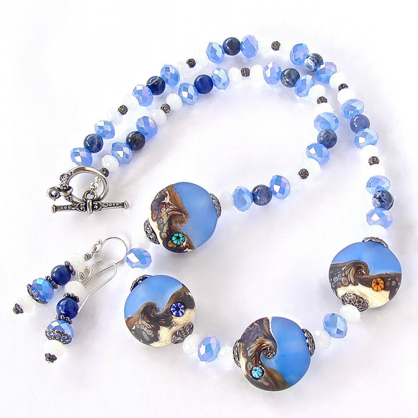 art glass necklace in blue and white