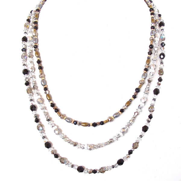 long necklace in silver and gold