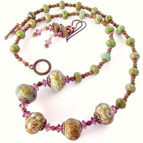 purple and green necklace with art glass